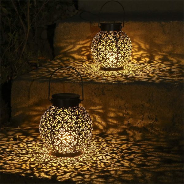 ML260104-2-Pack-Solar-Powered-Metal-Hanging-Lanterns,-Waterproof-Outdoor-Decorative-Lights-with-Projection-Pattern,-Glowing-Table-&-Hanging-Lamps-for-Patio,-Porch,-Backyard-&-Pathway-usage-scence