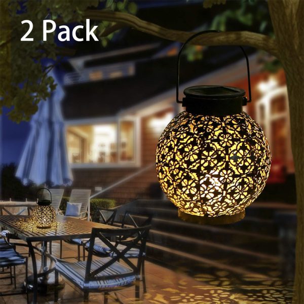 ML260104-2-Pack-Solar-Powered-Metal-Hanging-Lanterns,-Waterproof-Outdoor-Decorative-Lights-with-Projection-Pattern,-Glowing-Table-&-Hanging-Lamps-for-Patio,-Porch,-Backyard-&-Pathway-usage-scence1